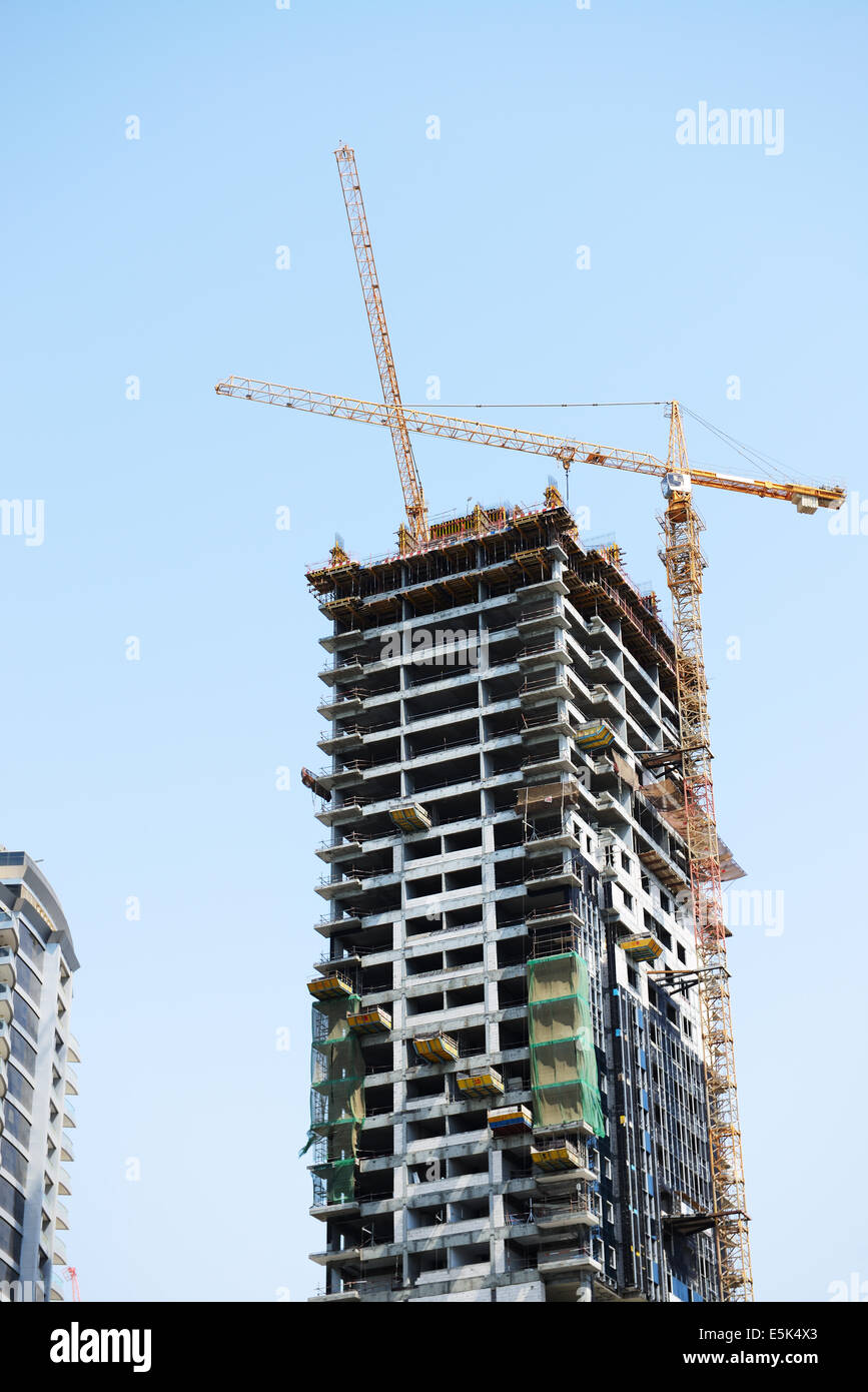 The construction of new skyscraper in Dubai city, UAE Stock Photo