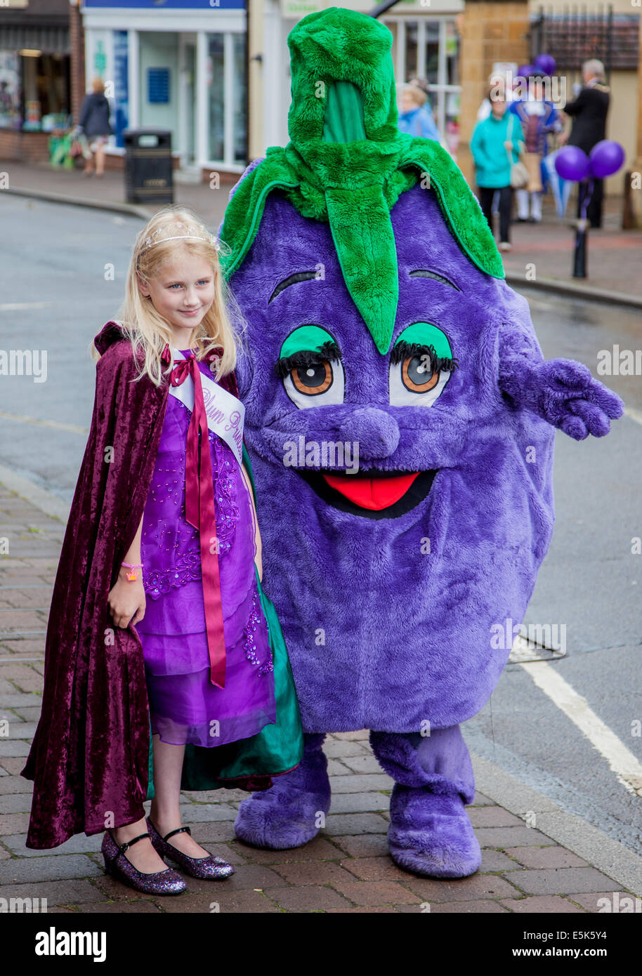 The 2014 Pershore Plum Princess and the pershore plum mascot at the