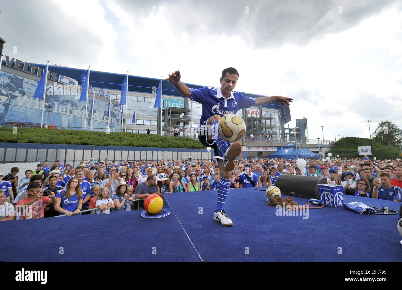 Gelsenkirchen, Germany. 03rd Aug, 2014. Schalke's Sinan OztUrk performs on stage during the supporting program of the Schalke Cup test matches on the Schalke Day in front of the Veltins-Arena in Gelsenkirchen, Germany, 03 August 2014. Photo: Matthias Balk/dpa/Alamy Live News Stock Photo
