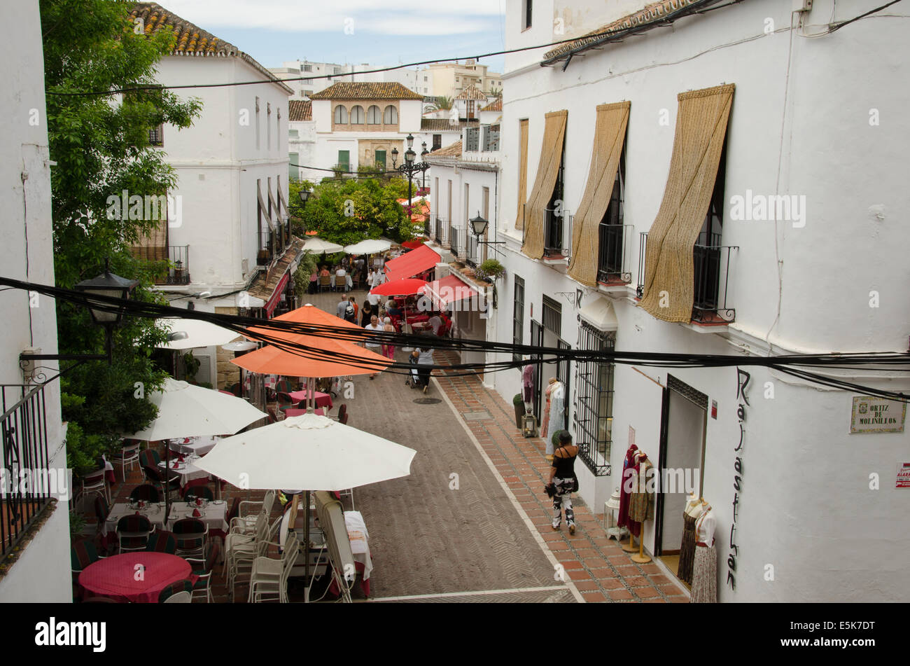Chinchillas street leading to Plaza de los Naranjos, old town of Marbella, Spain Stock Photo