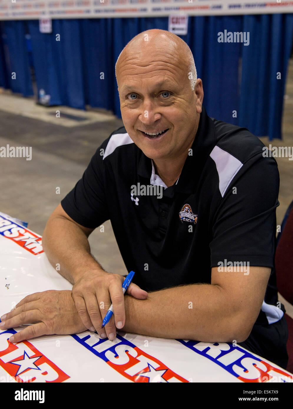 Cleveland, Ohio, USA. 02nd Aug, 2014. MLB Hall of Famer CAL RIPKEN, JR. signs autographs during the 35th National Sports Collectors Convention at the I-X Center. The five-day show, the largest of its kind in the country, is expected to draw more than 40,000 attendees. Among the offerings are in-person autograph signings from more than 100 sports celebrities, as well as sports cards, toys, game-used jerseys and a cornucopia of other collectible memorabilia. © Brian Cahn/ZUMA Wire/Alamy Live News Stock Photo
