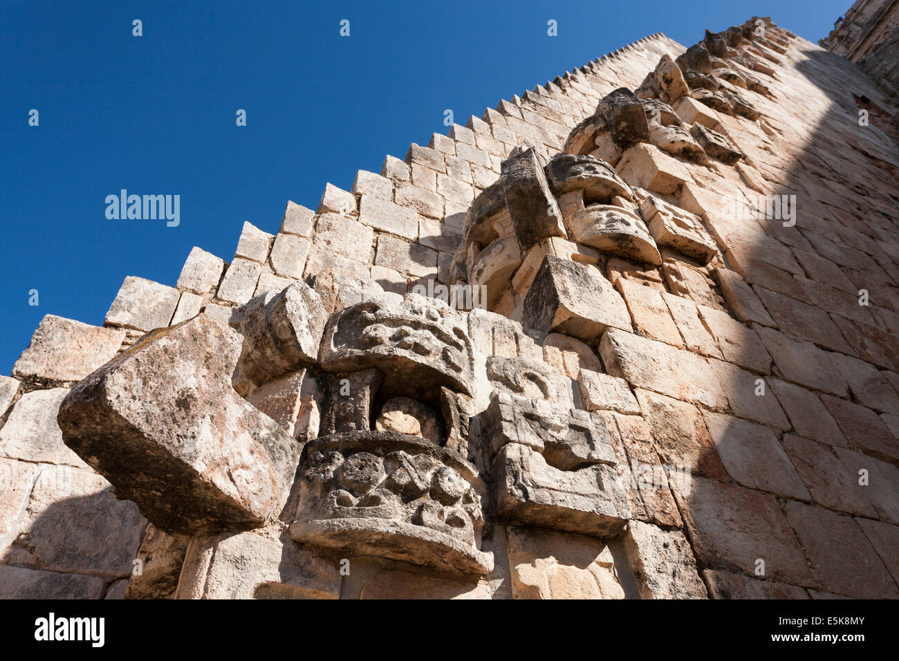 Back Staircase leading to the Temple with decorations. To the top of   Adivino pyramid paralleled by symbolic carvings Stock Photo