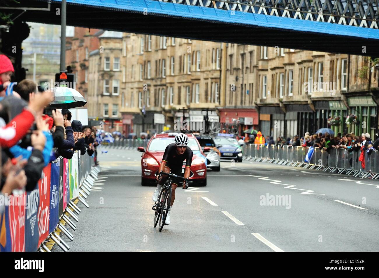 Competitors race through tough conditions including heavy rain as they ...