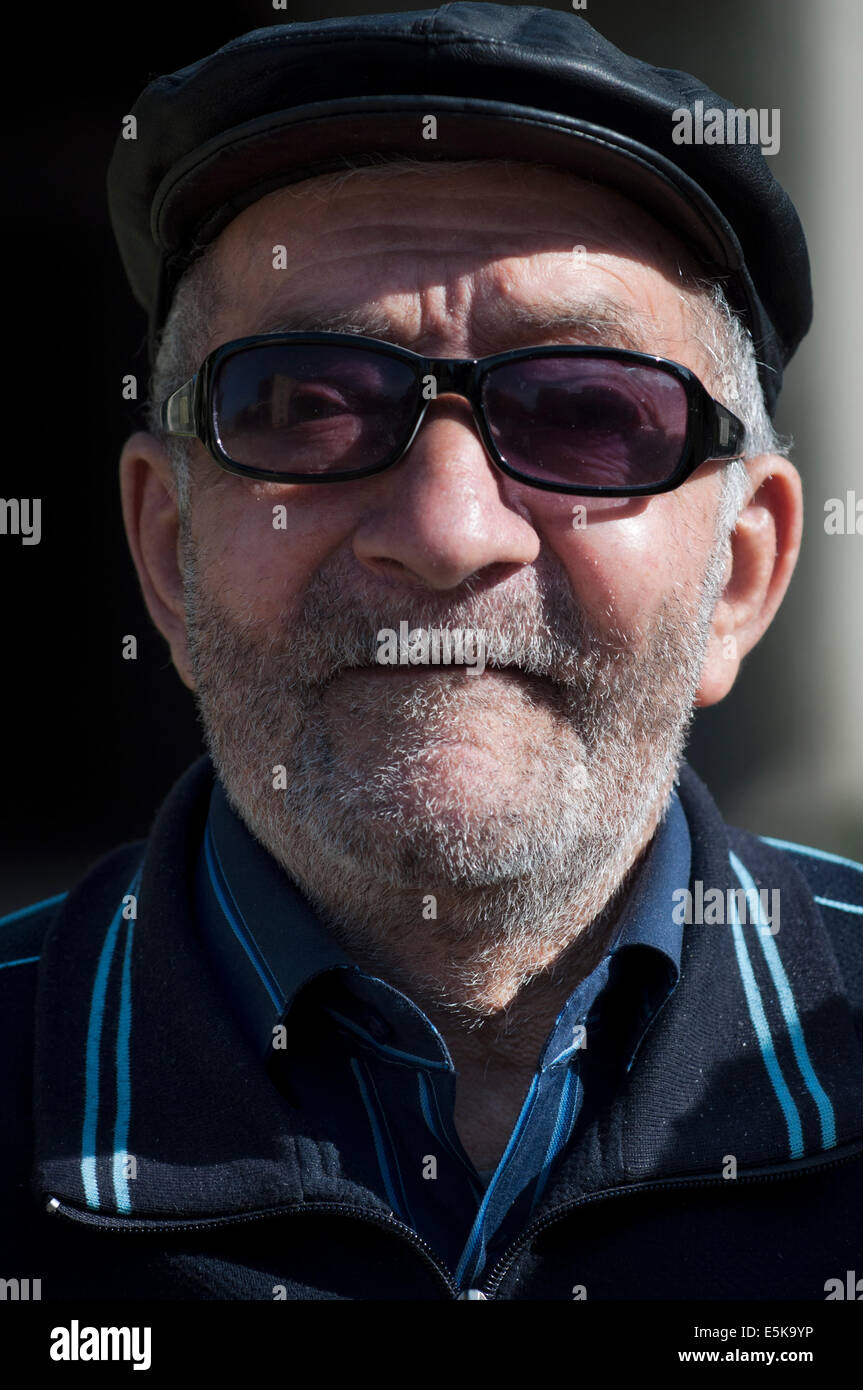 Elderly man with sun glasses, Sushi, unrecognized state of Nagorno-Karabakh Stock Photo