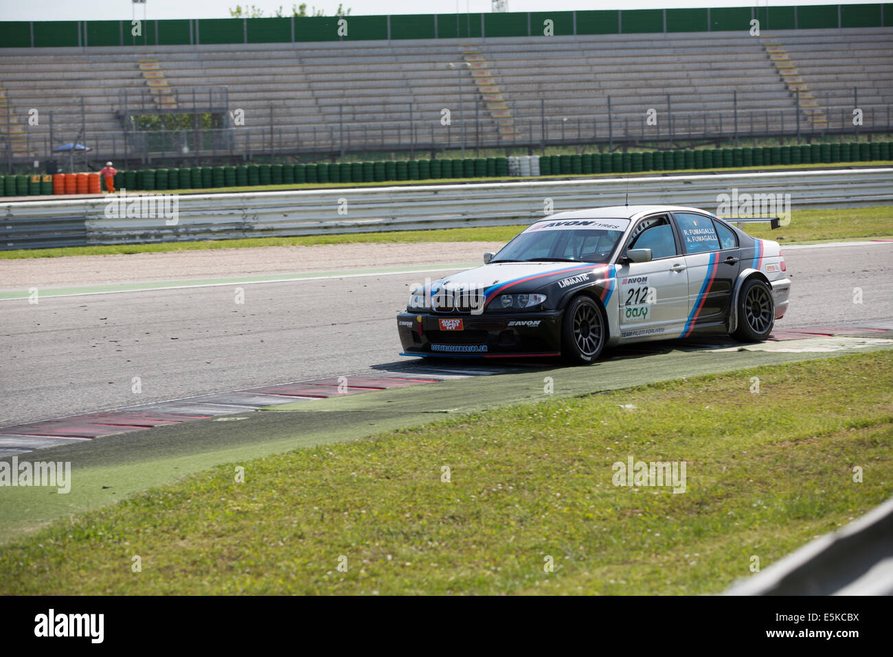 MISANO ADRIATICO, Rimini, ITALY - May 10: A BMW 320I driven by FUMAGALLI Alberto and (ITA) FUMAGALLI Riccardo (ITA) Team Zerocinque during the C.I.Turismo Endurance on May 10, 2014 in Misano Adriatico, Rimini, Italy. Stock Photo