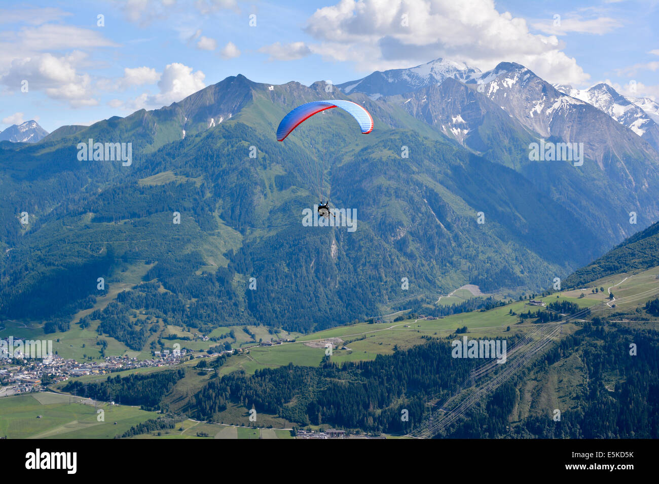 Paragliding in the Austrian Alps mountains Stock Photo