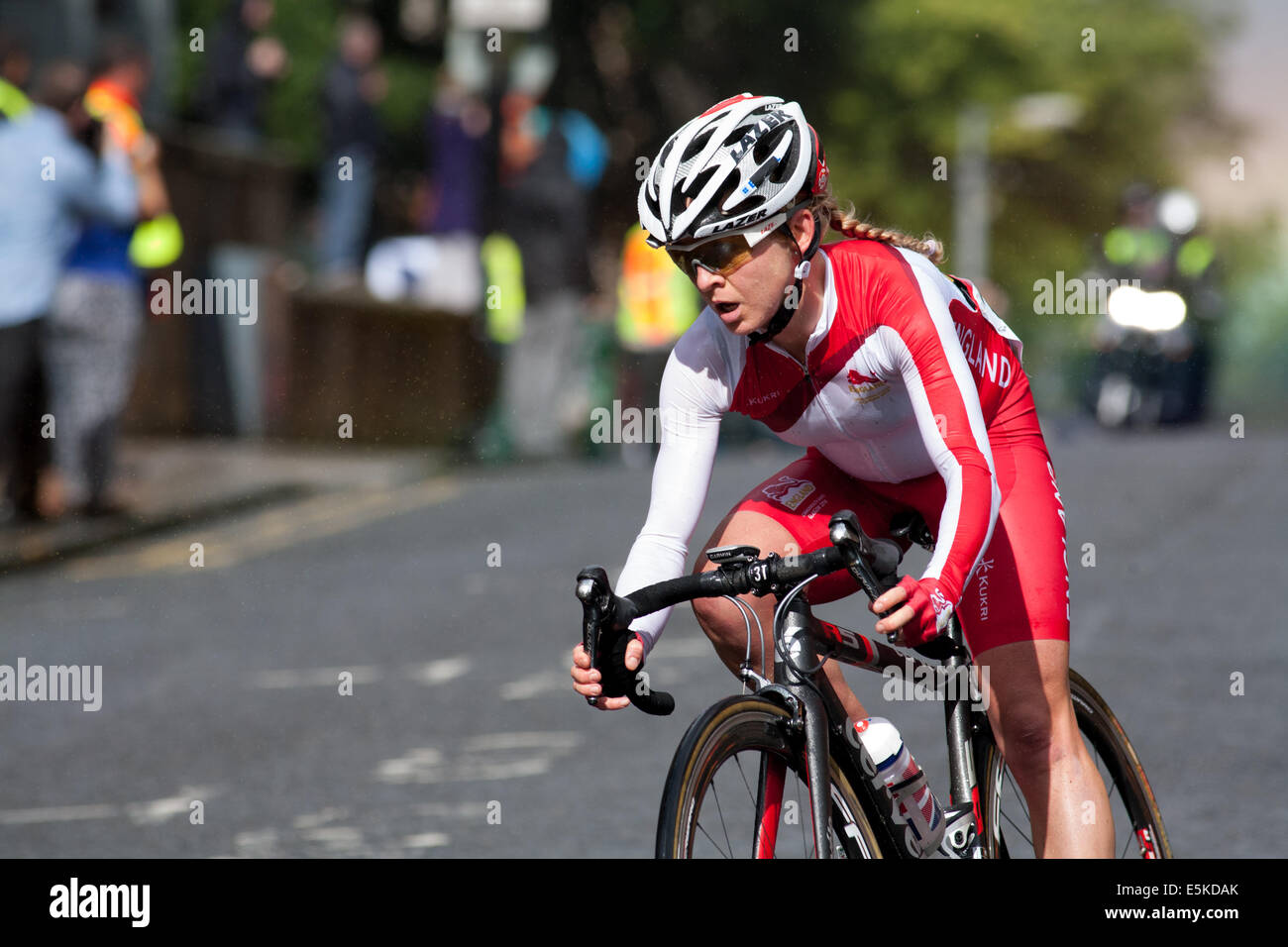 GLASGOW, UK, Scotland, 3rd August, 2014.  Emma Pooley with a rainbow behind her on her way to a silver medal at the Commonwealth Games Ladies Cycling Road Race. Credit:  Ian McFarlane/Alamy Live News Stock Photo