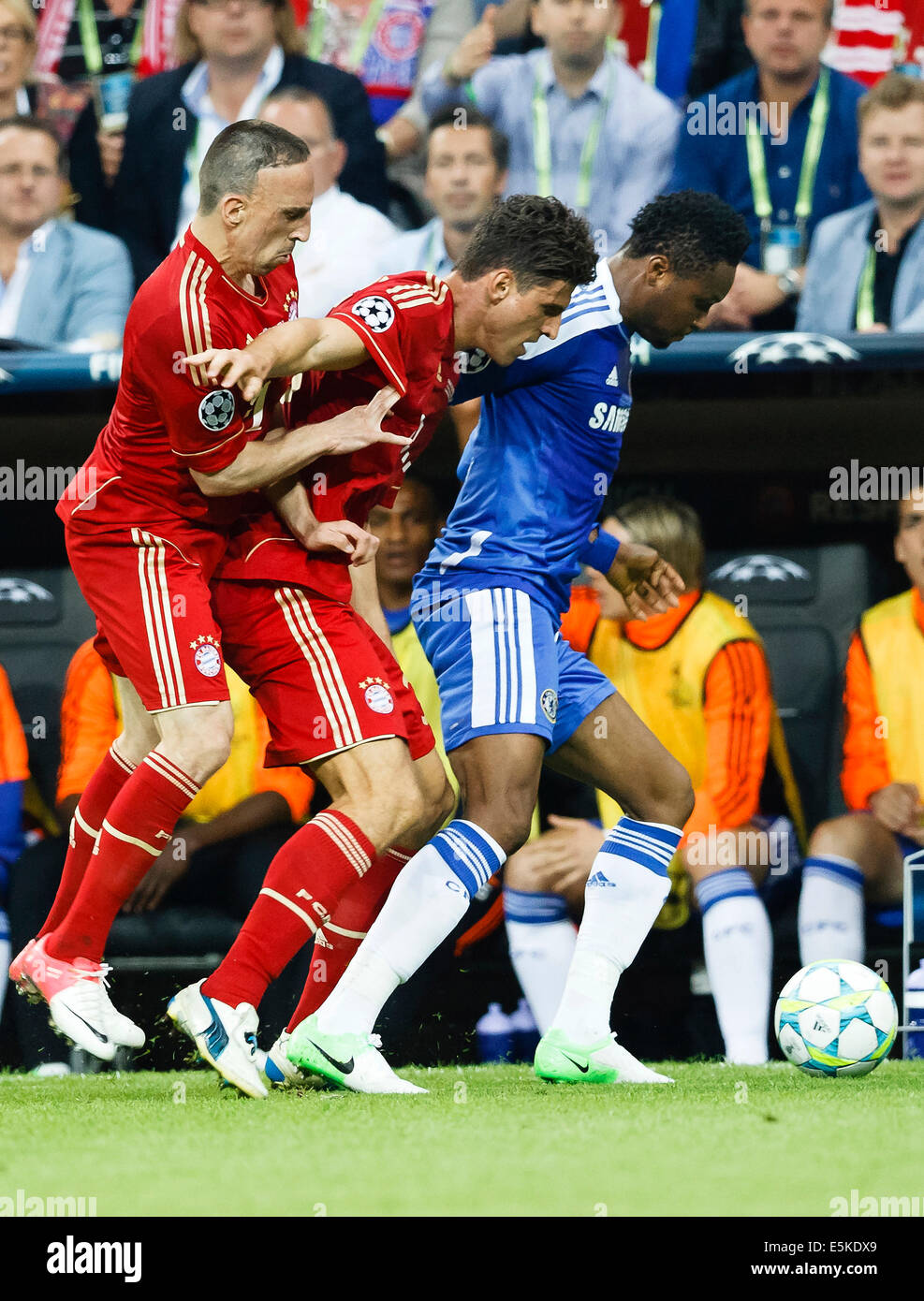 Mikel of Chelsea (L), Gomez (M) and Ribery (L) of Bayern Stock Photo