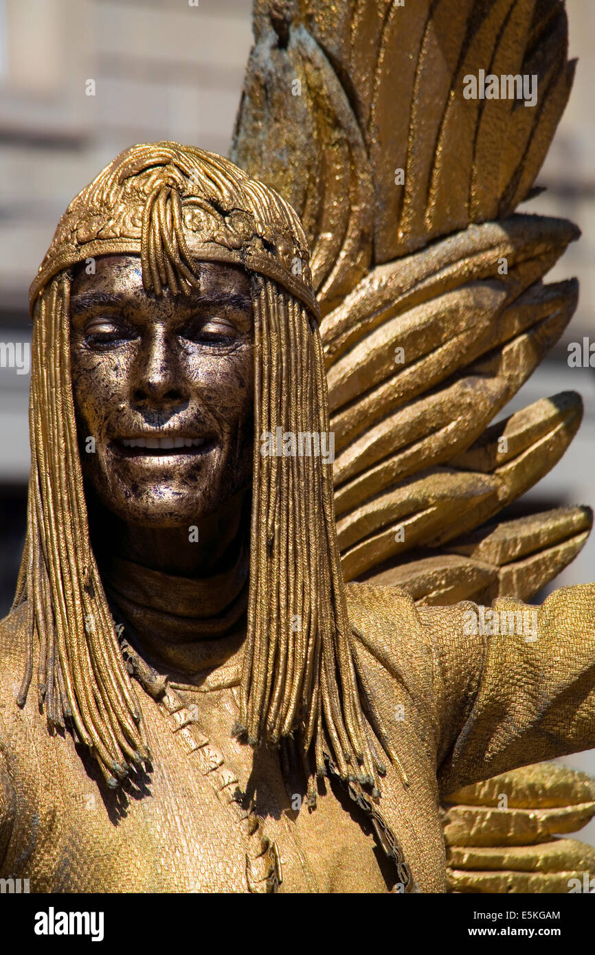 Caren Valderrama is a Professional Living Statue, the Golden Angel of the Ramblas in Barcelona, Catalonia, Spain Stock Photo