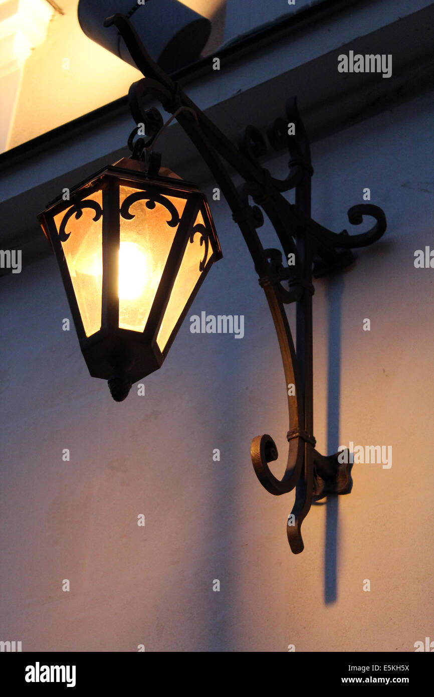 nice lantern on the wall of house Stock Photo