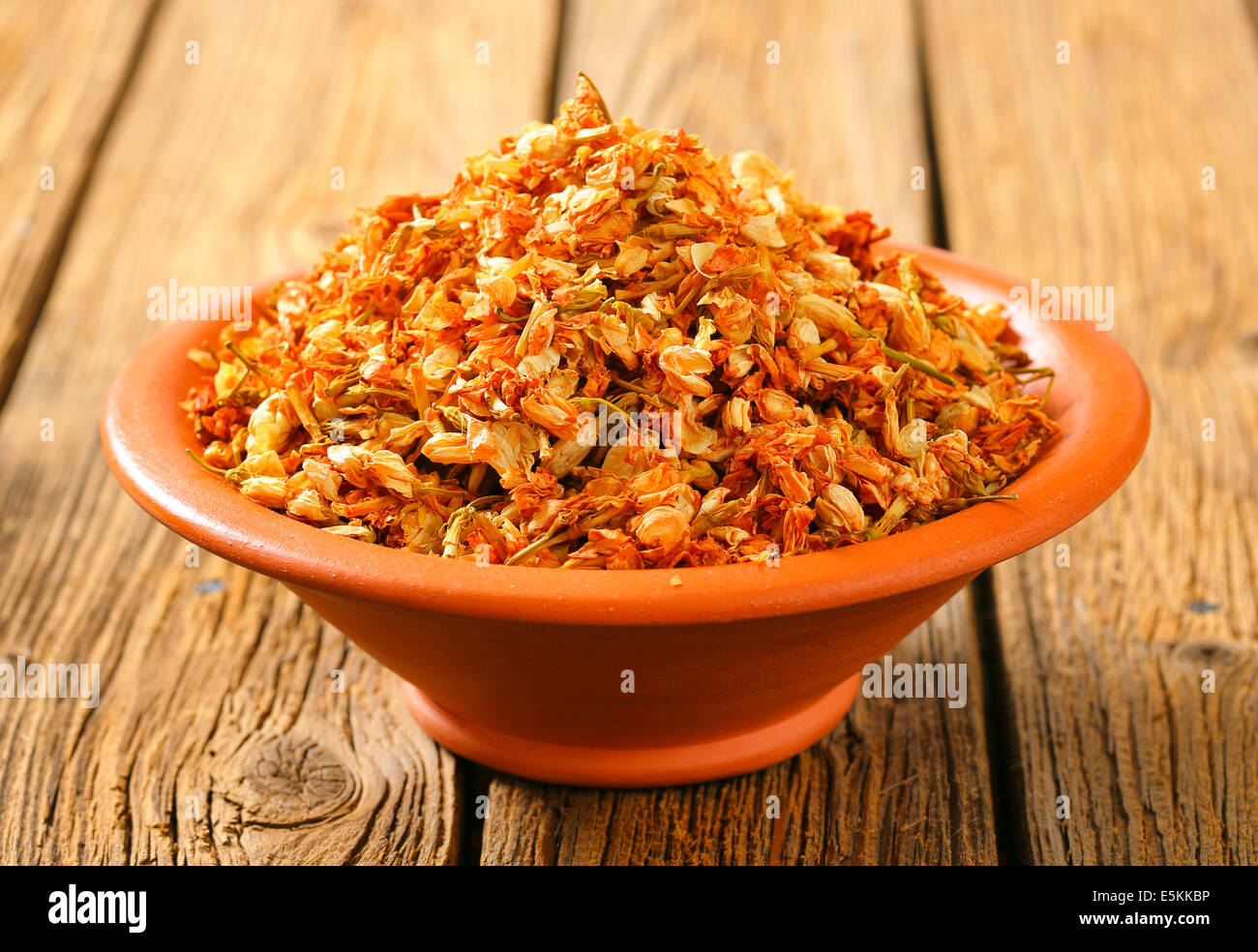 Bowl of dried jasmine flowers Stock Photo Alamy