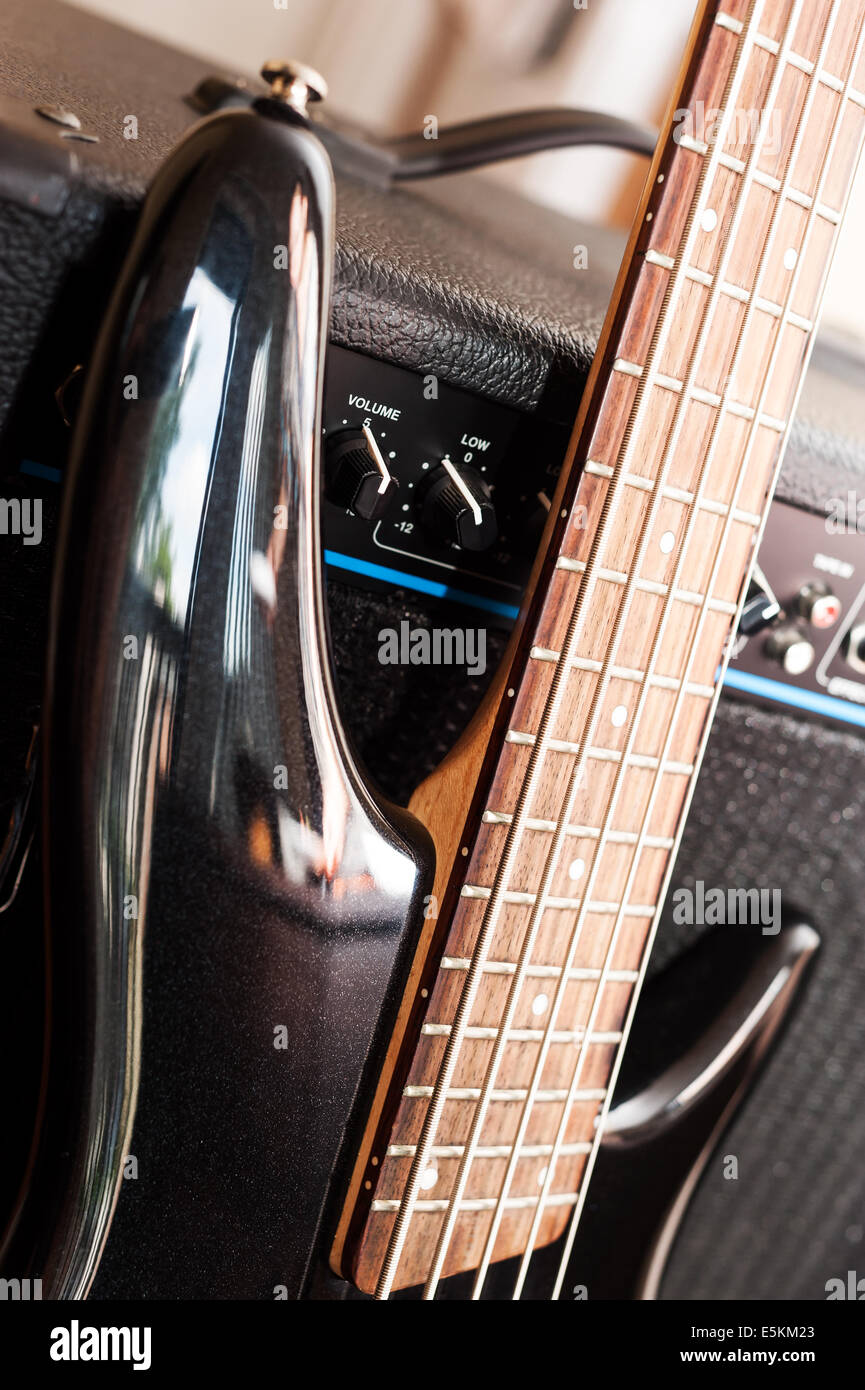 Five string bass guitar with combo amplifier Stock Photo