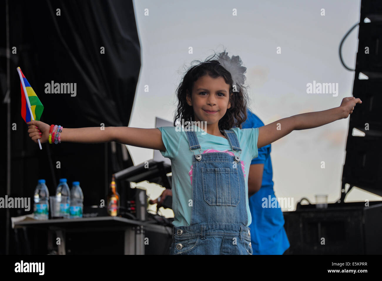 London, UK, 3rd August 2014 : Thousands attends the Mauritian culture celebrate of the sixth Mauritian Open Air Festival 2014 at Down Lane Park. Husband and wife Alain Ramanisum is a Indo-Mauritian sega musician and wife Laura Beg Ramanisum performances live with speacial guests Miss England 2014 Carina Tyrell and Mr England 2014 Jordan Williams fantastic food and craft stalls in London. Credit:  See Li/Alamy Live News Stock Photo