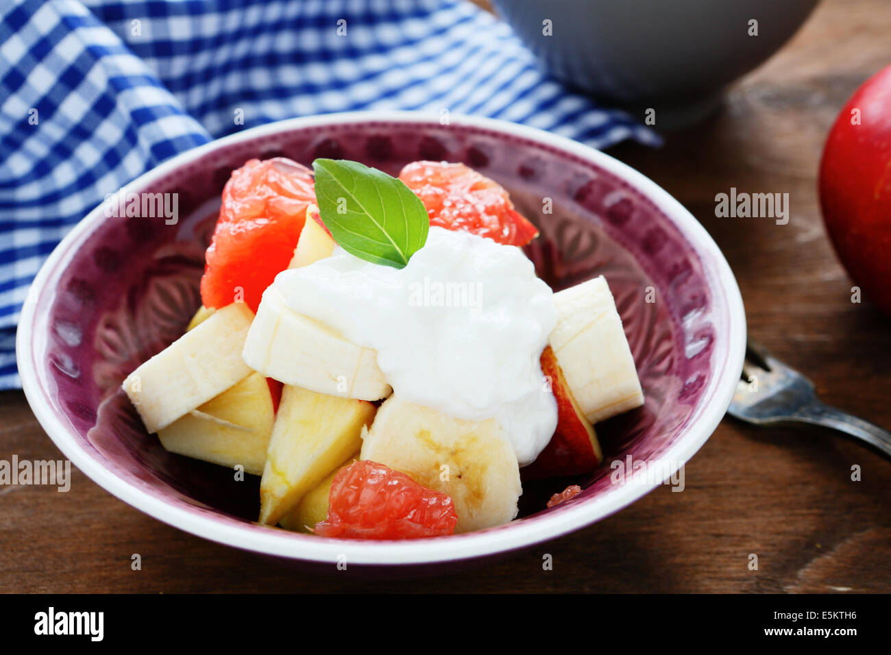fruit salad with Greek yogurt, food closeup Stock Photo