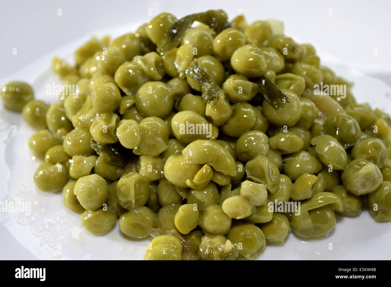 stewed peas with onions Stock Photo