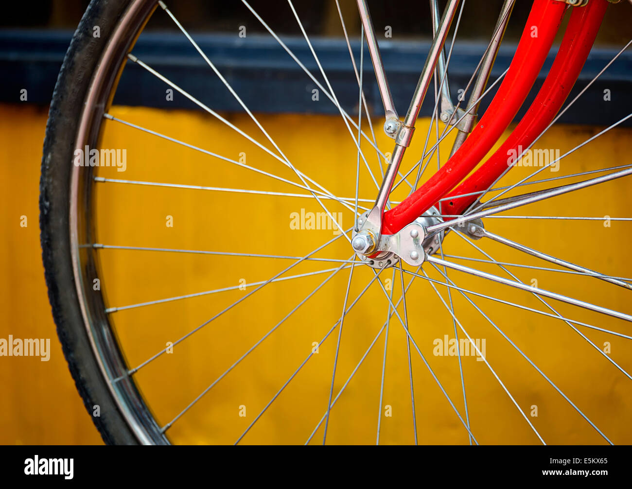 Vintage looking Detail of a red bicycle wheel Stock Photo - Alamy