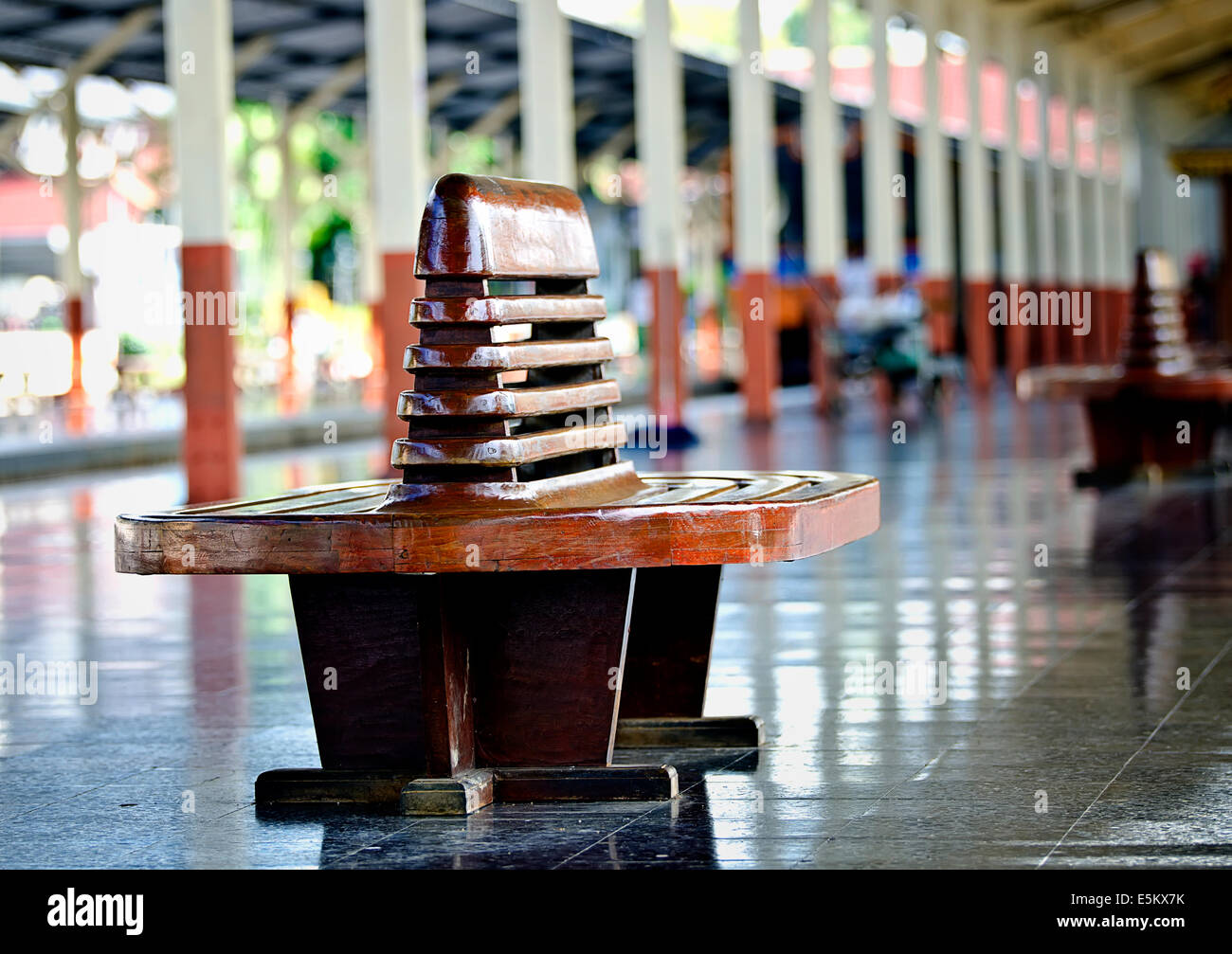 Wooden bench in railway station Stock Photo Alamy