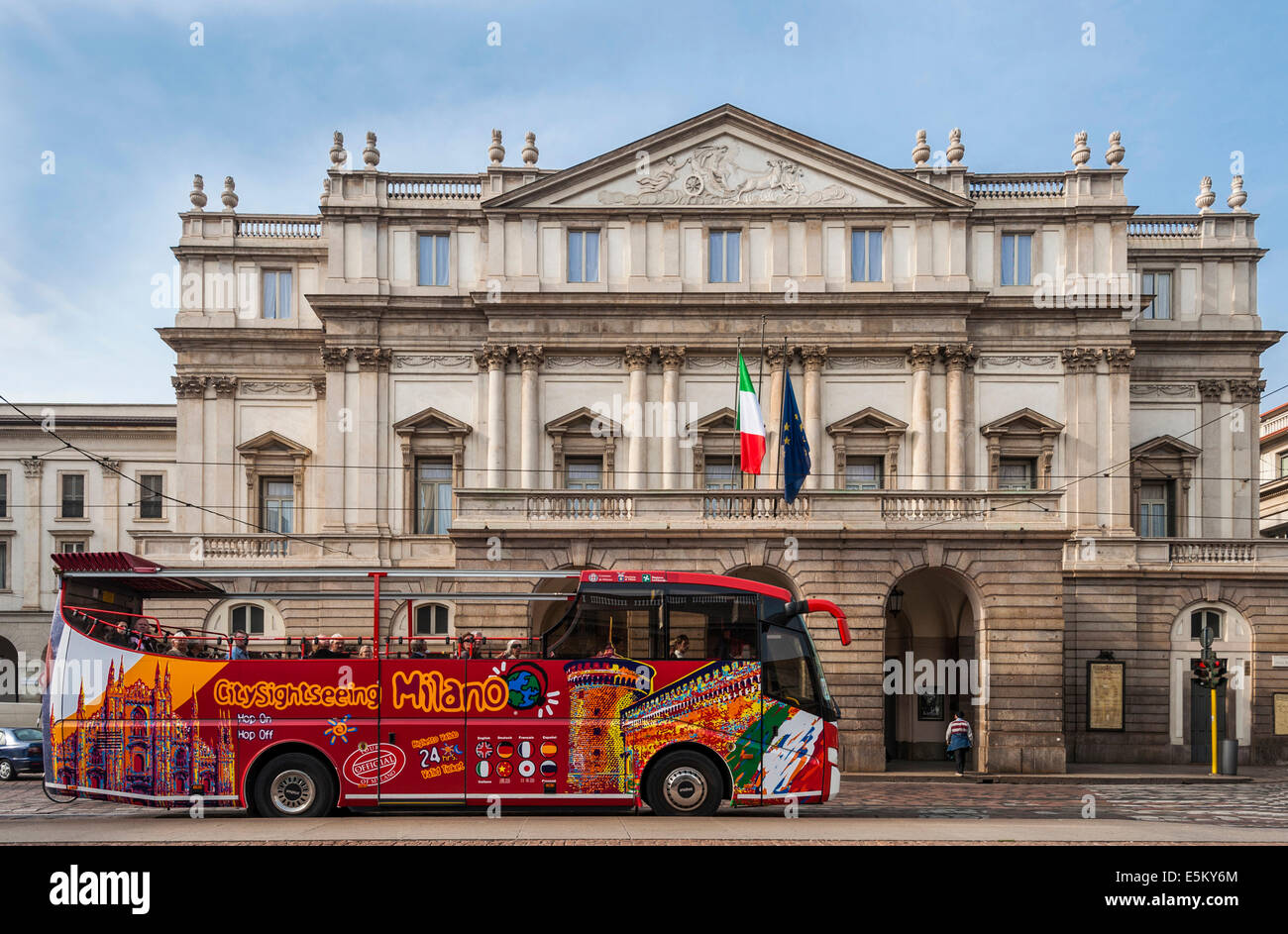 Sightseeing bus in front of La Scala, Milan, Lombardy, Italy Stock Photo