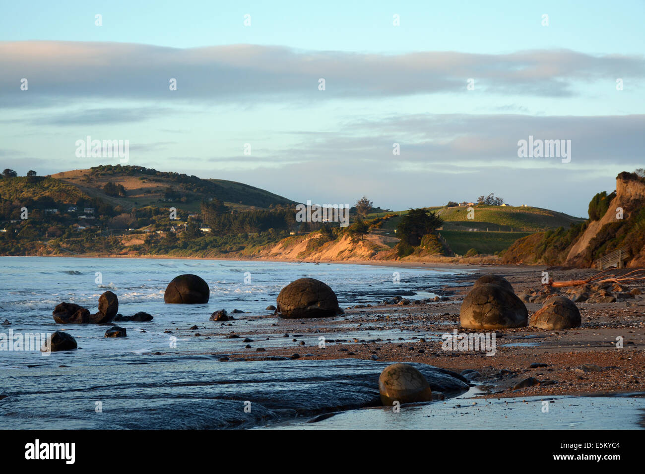 A giant ball shaped boulder almost covered in sand on the beach at Moeraki  South Island New Zealand Stock Photo - Alamy, boulder ball 