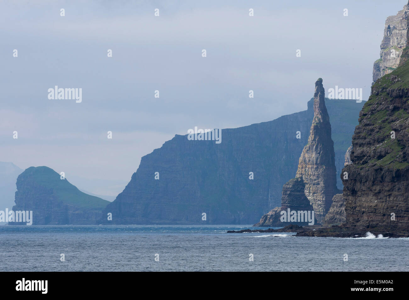 Rock pinnacle, west coast of Sandoy, Faroe Islands, Denmark Stock Photo