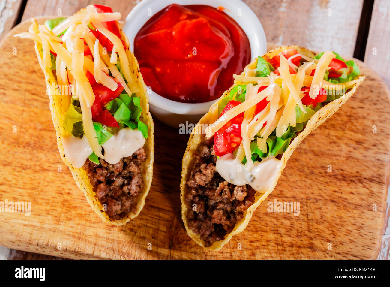tacos with minced meat with greens and tomatoes Stock Photo