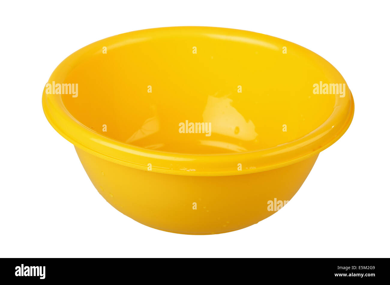 yellow plastic bowl, isolated on white Stock Photo