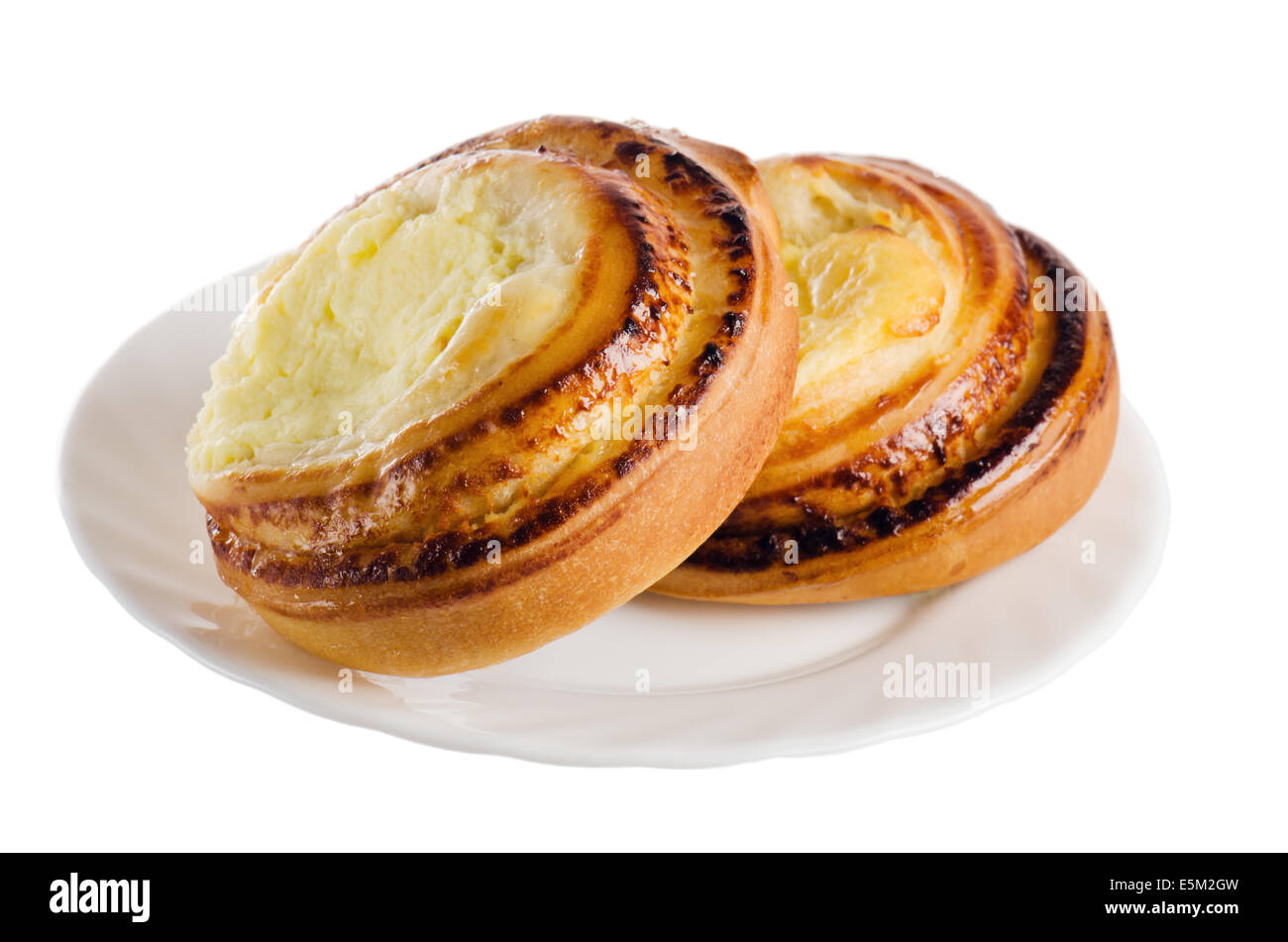 Fresh bread rolls with cheese on a saucer is isolated on white Stock Photo