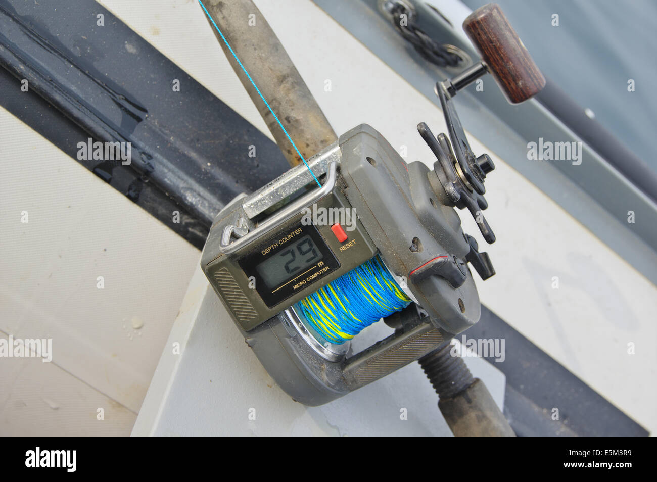 big game fishing reel with  electronic counter in natural setting Stock Photo