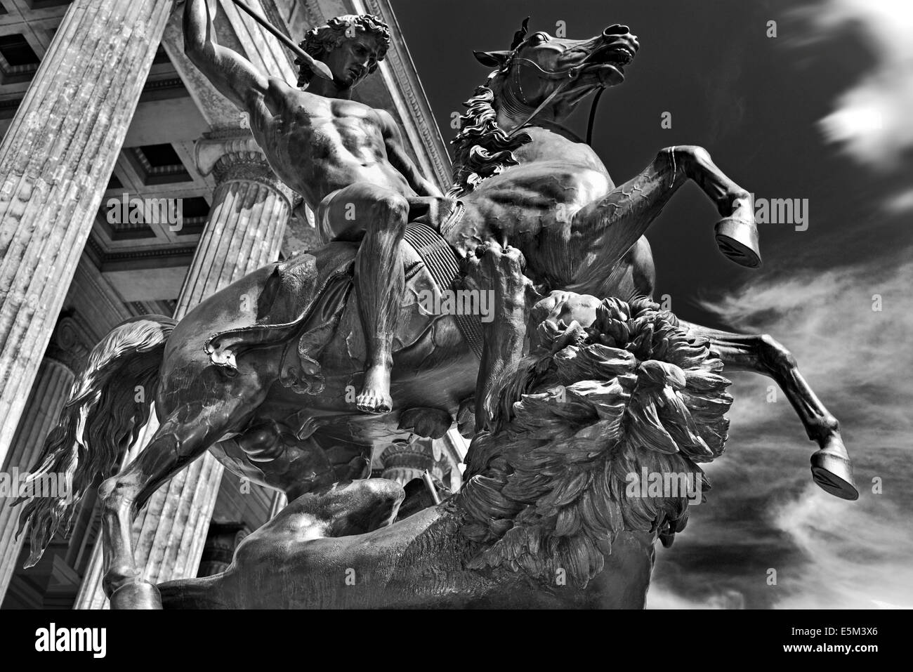 Germany, Berlin: Side view of a equestrian statue of a Lion fighter in front of the Altes Museum Stock Photo