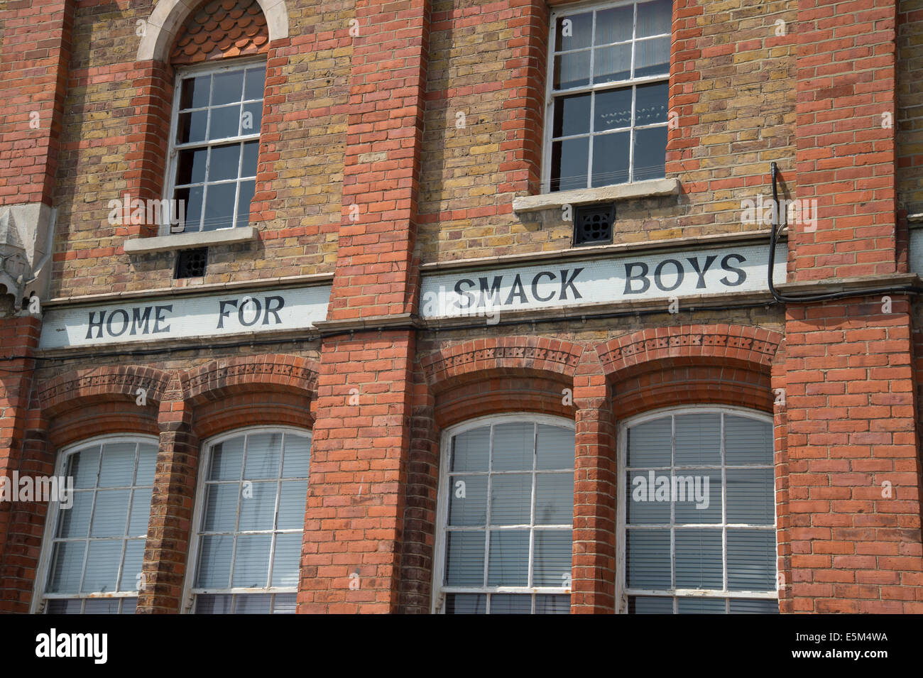 Ramsgate, Kent. Restored red brick building with sign 'Home for Smack Boys' Stock Photo