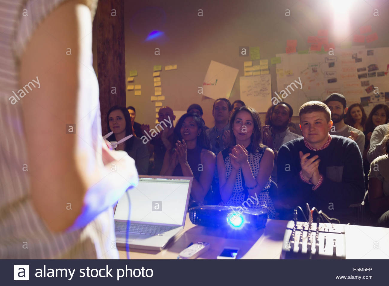 Audience clapping for speaker Stock Photo