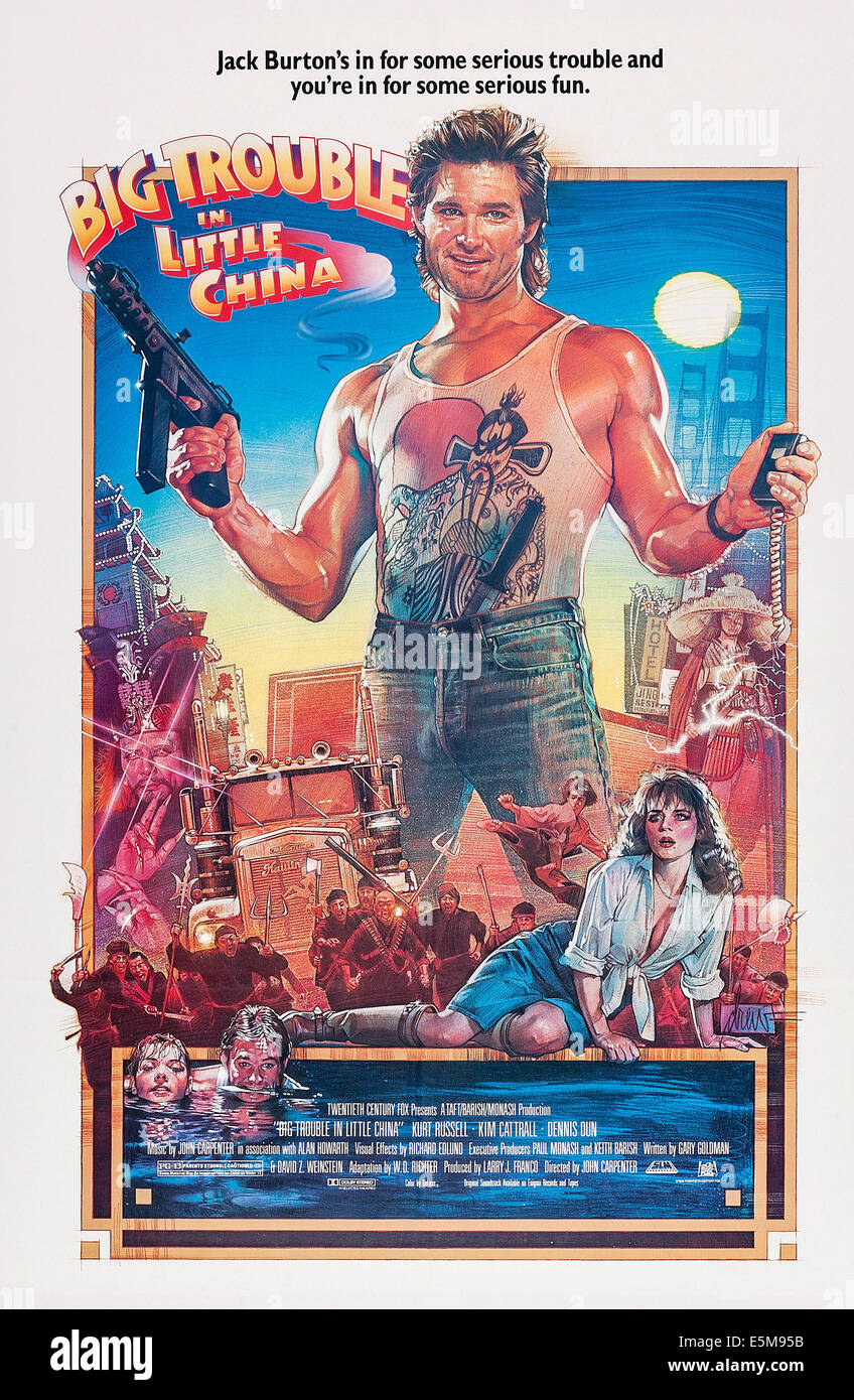 BIG TROUBLE IN LITTLE CHINA, center holding guns: Kurt Russell; center   kneeling: Kim Cattrall,    1986, TM and Copyright (c) Stock Photo