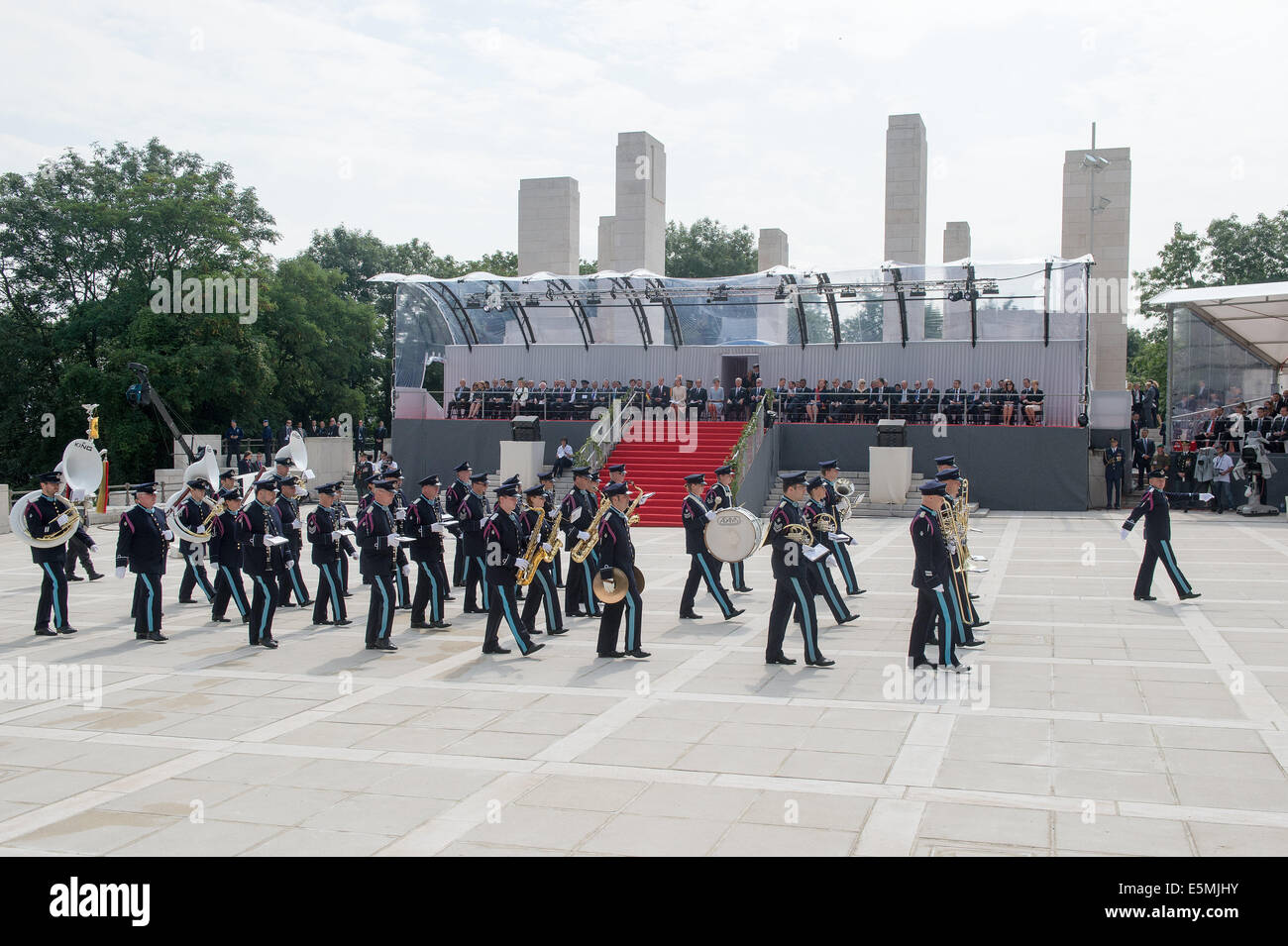 Liege, Belgium. 04th Aug, 2014. Guests of honor attend music parade of the international memorial ceremony for the 100th anniversary of the beginning of the First World War in Liege, Belgium, 04 August 2014. The year 2014 sees the 100th anniversary of the beginning of WWI, or the Great War, which according to official statistics cost more than 37 million military and civilian casualties between 1914 and 1918. Photo: Maurizio Gambarini/dpa/Alamy Live News Stock Photo