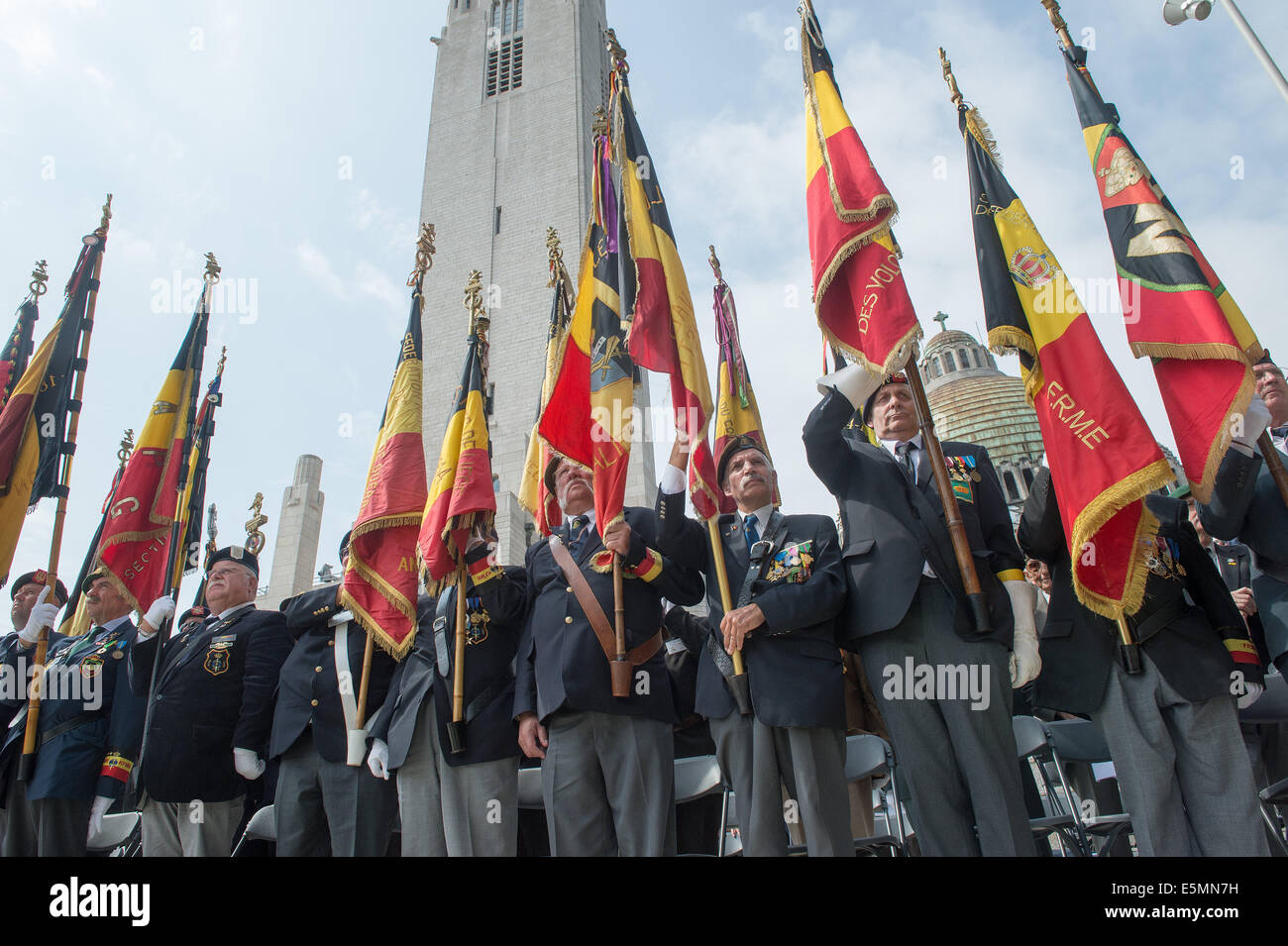 Liege, Belgium. 04th Aug, 2014. Belgian veterans take part in the international memorial ceremony for the 100th anniversary of the beginning of the First World War in Liege, Belgium, 04 August 2014. The year 2014 sees the 100th anniversary of the beginning of WWI, or the Great War, which according to official statistics cost more than 37 million military and civilian casualties between 1914 and 1918. Photo: Maurizio Gambarini/dpa/Alamy Live News Stock Photo