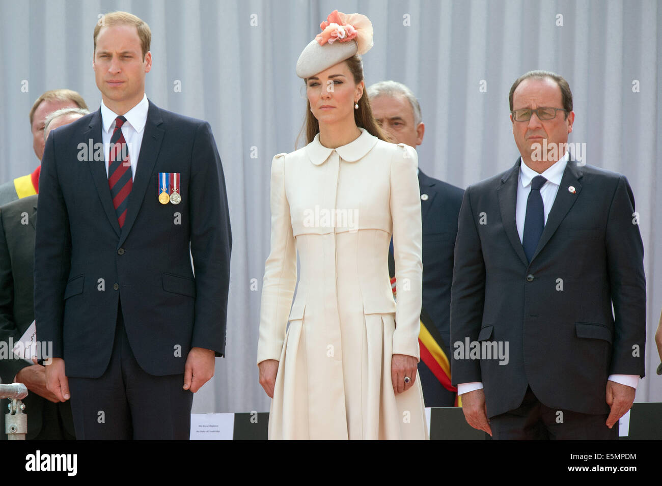 Liege, Belgium. 04th Aug, 2014. British Prince William (L-R), his wife, Duchess Kate, and French President Francois Hollande take part in the international memorial ceremony for the 100th anniversary of the beginning of the First World War in Liege, Belgium, 04 August 2014. The year 2014 sees the 100th anniversary of the beginning of WWI, or the Great War, which according to official statistics cost more than 37 million military and civilian casualties between 1914 and 1918. Photo: Maurizio Gambarini/dpa/Alamy Live News Stock Photo