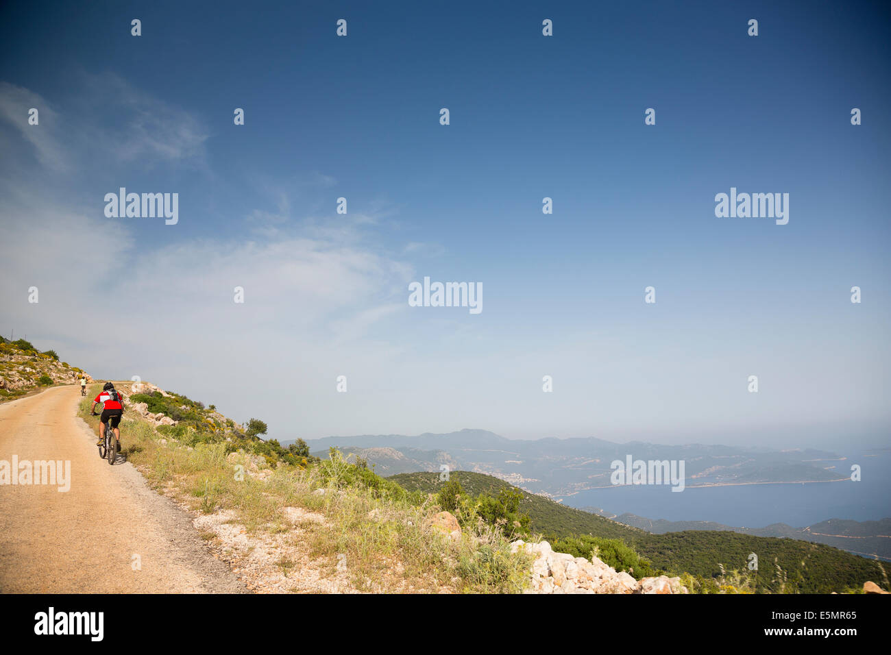 KAS, TURKEY Exodus cycling clients climbing hill. Stock Photo