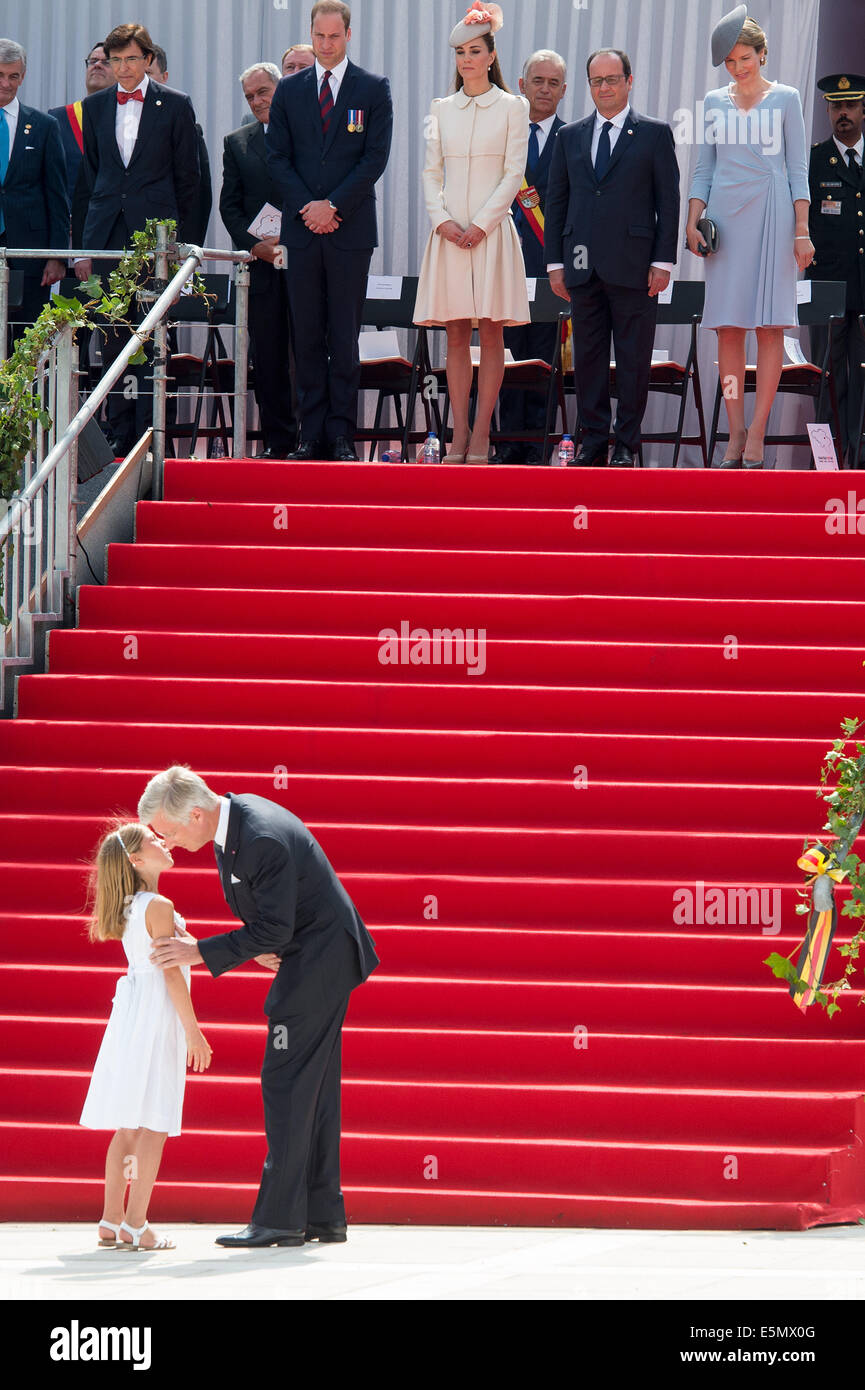 Liege, Belgium. 04th Aug, 2014. King Philippe of Belgium talks to a young girl during the international memorial ceremony for the 100th anniversary of the beginning of the First World War in Liege, Belgium, 04 August 2014. The year 2014 sees the 100th anniversary of the beginning of WWI, or the Great War, which according to official statistics cost more than 37 million military and civilian casualties between 1914 and 1918. Photo: Maurizio Gambarini/dpa/Alamy Live News Stock Photo