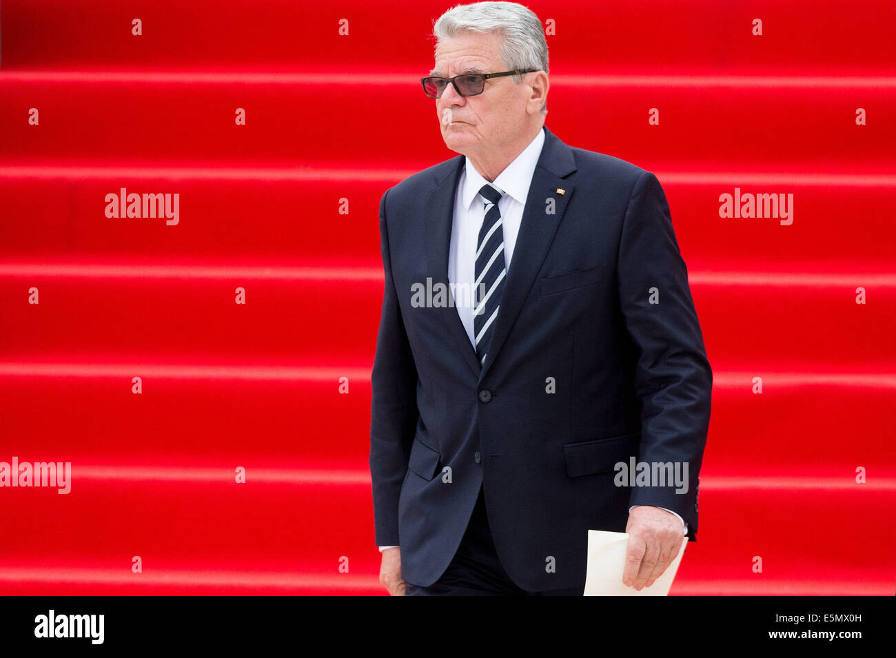 Liege, Belgium. 04th Aug, 2014. German President Joachim Gauck attends the international memorial ceremony for the 100th anniversary of the beginning of the First World War in Liege, Belgium, 04 August 2014. The year 2014 sees the 100th anniversary of the beginning of WWI, or the Great War, which according to official statistics cost more than 37 million military and civilian casualties between 1914 and 1918. Photo: Maurizio Gambarini/dpa/Alamy Live News Stock Photo