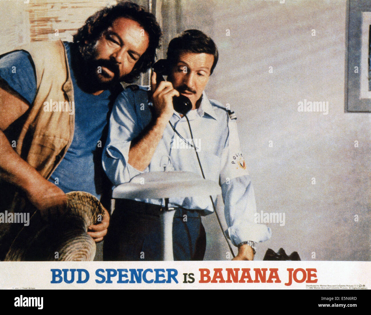 BANANA JOE, from left: Bud Spencer, Carlo Reali, 1982. ©Derby Cinematografica/courtesy Everett Collection Stock Photo