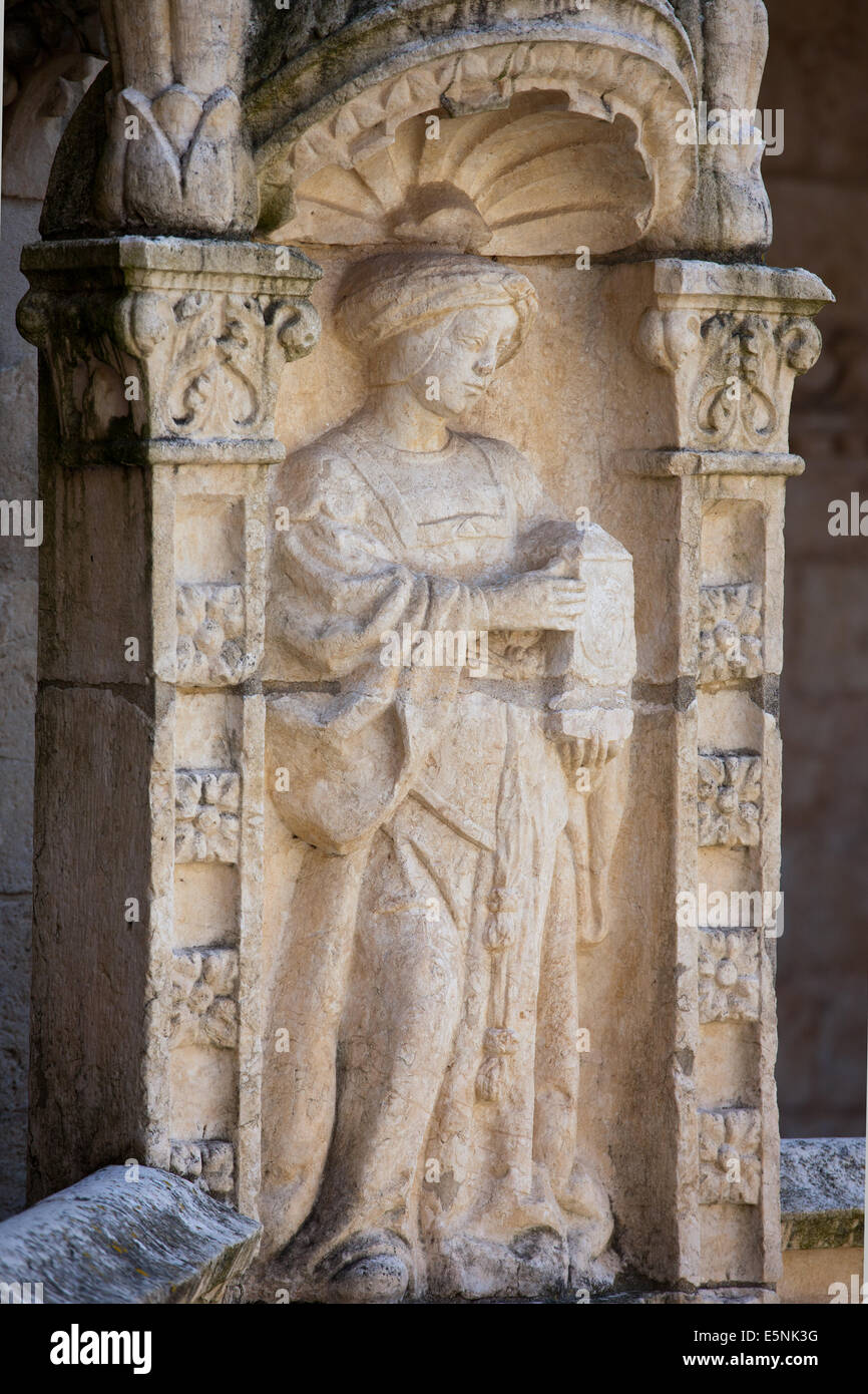 Carving of a woman in cloister of the Jeronimos Monastery in Lisbon, Portugal. Stock Photo