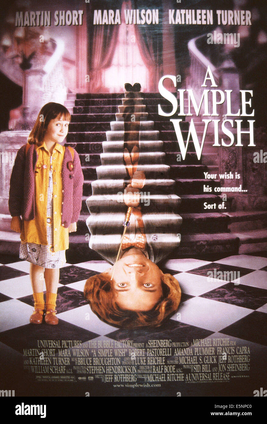A SIMPLE WISH, US poster art, from left: Mara Wilson, Martin Short, 1997. ©Universal/courtesy Everett Collection Stock Photo