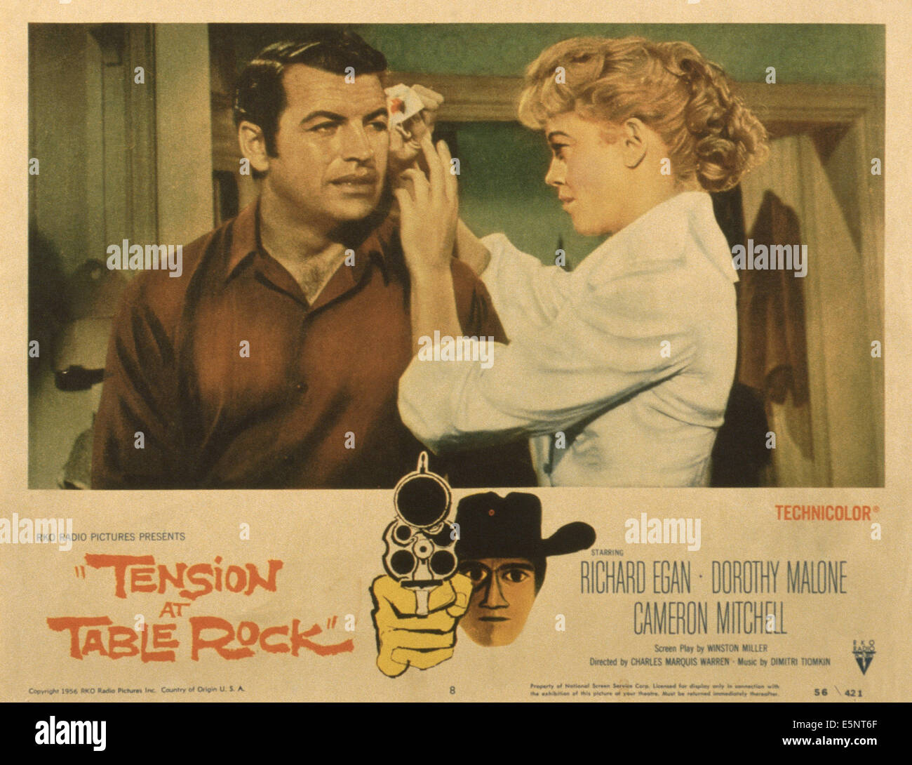 TENSION AT TABLE ROCK, US lobbycard, from left: Richard Egan, Dorothy Malone, 1956 Stock Photo