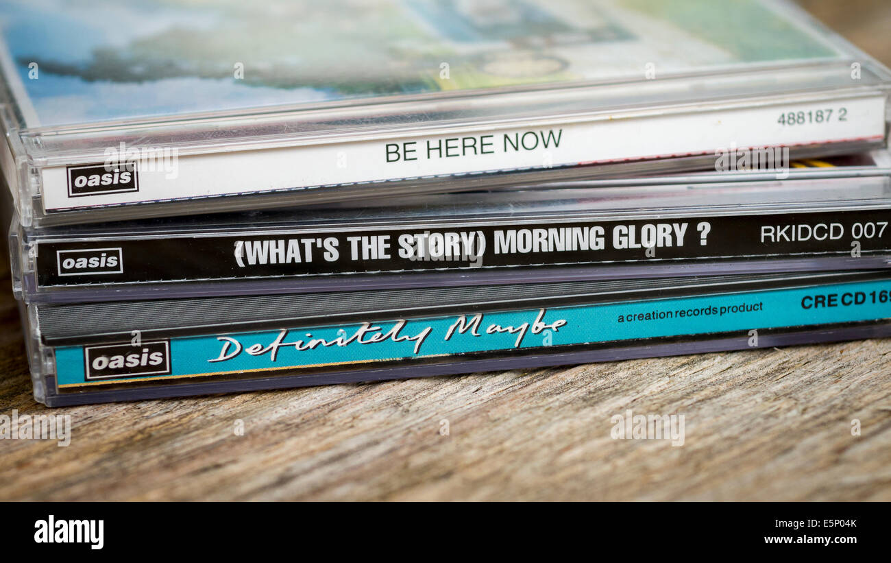 Oasis CD Albums, Definitely Maybe - 1994, What's The story Morning Glory - 1995, Be Here Now - 1997. Stock Photo