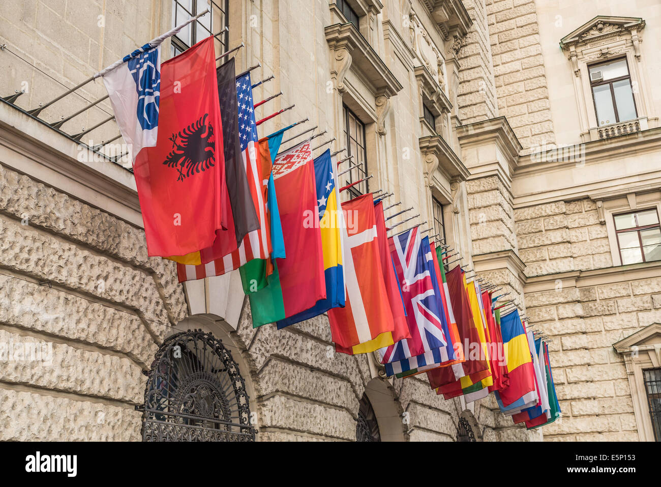 International set of flags at the Hofburg palace in Vienna, Austria Stock Photo