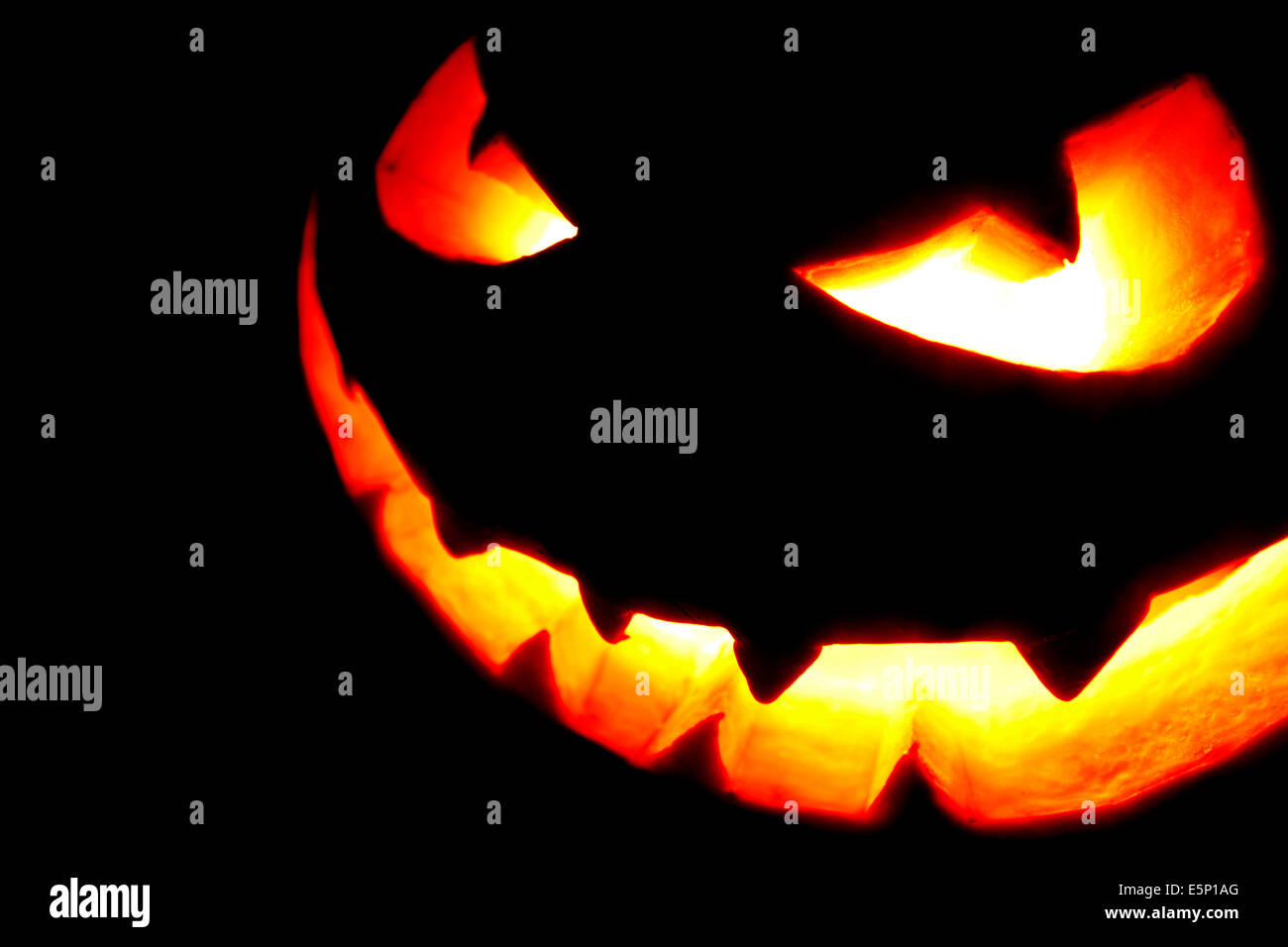 Scary faces of Halloween pumpkin isolated on black background Stock ...