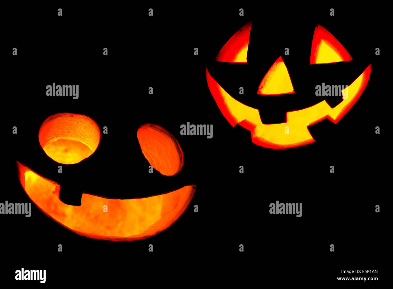 Scary facess of Halloween pumpkins isolated on black background Stock ...