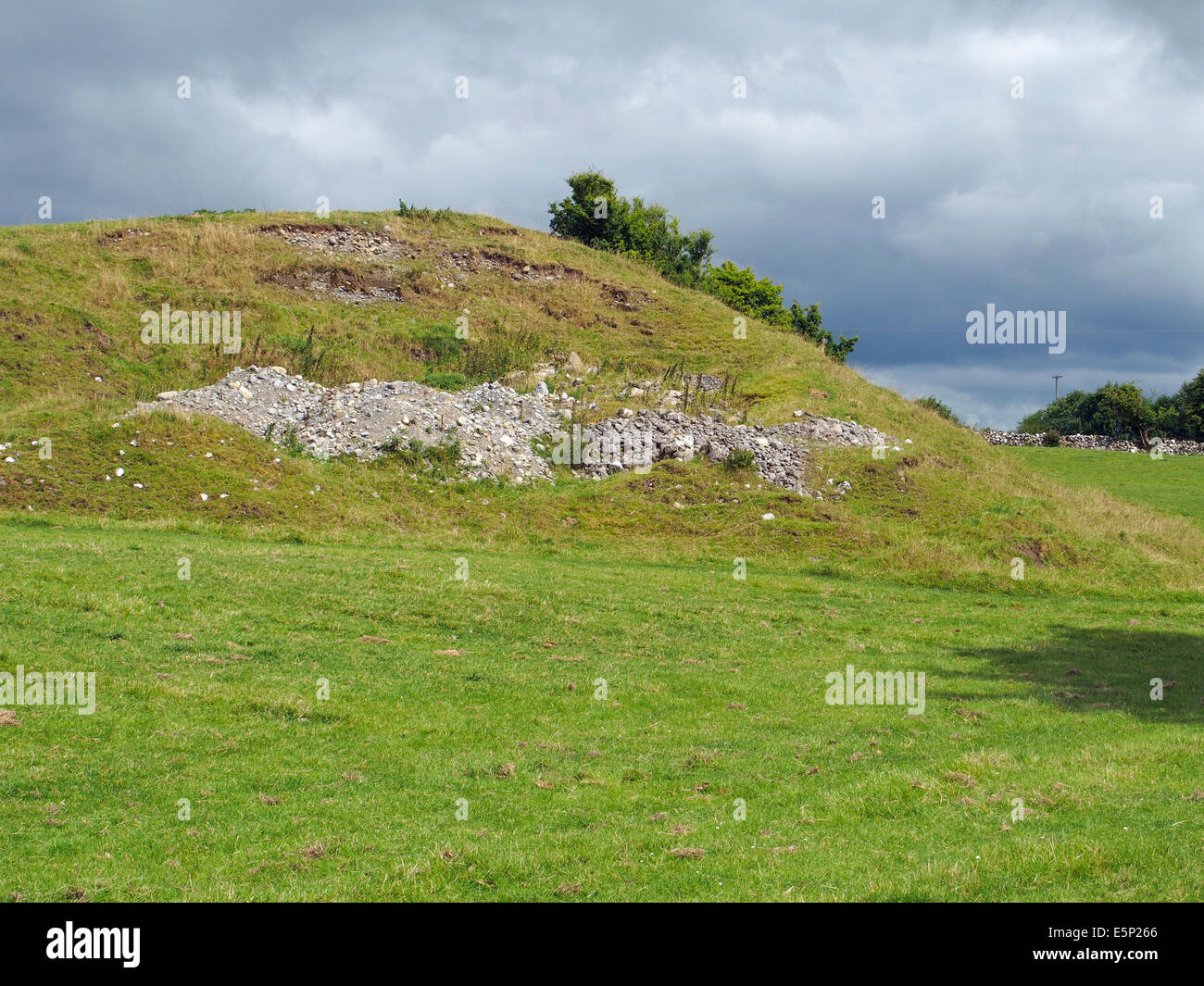A drumlin, an elongated hill in the shape of an inverted egg is a glacial landform. This example near Dunmore, Galway, Ireland. Stock Photo