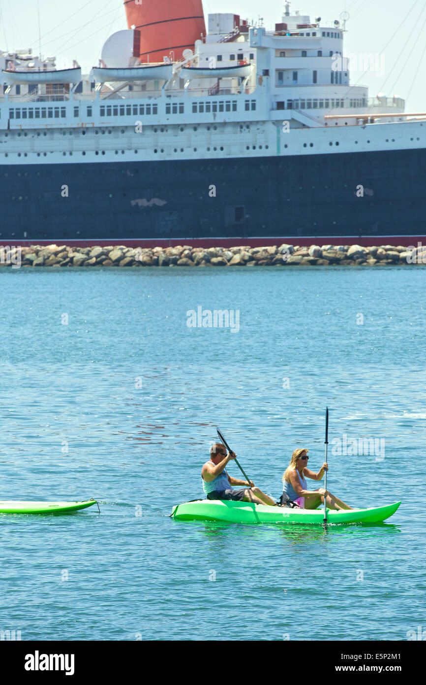 Paddling Past The Queen. Long Beach, California. Stock Photo