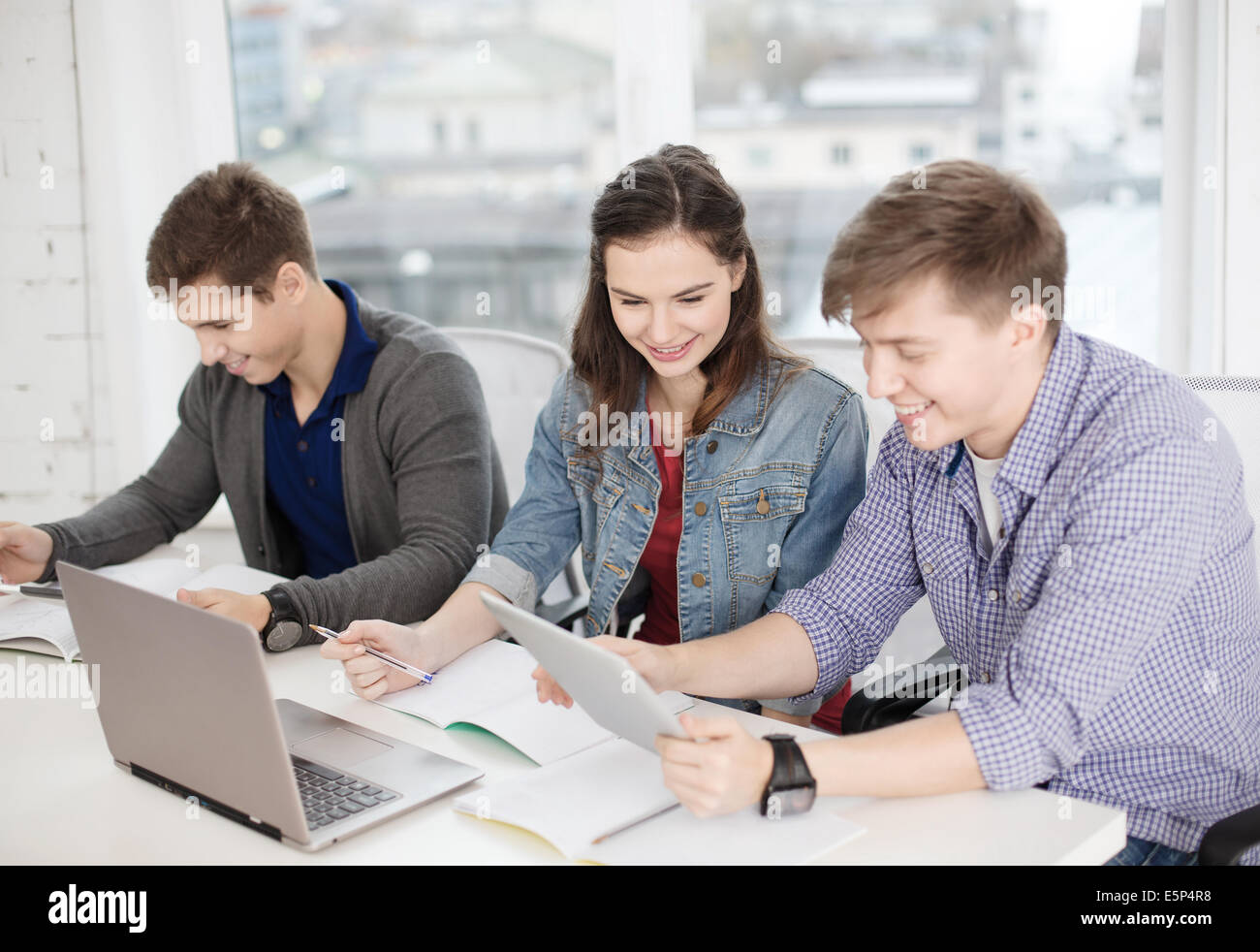 students with laptop, notebooks and tablet pc Stock Photo - Alamy
