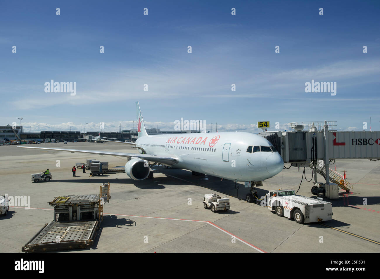 Air Canada 777 at YVR Vancouver International Airport terminal. Stock Photo